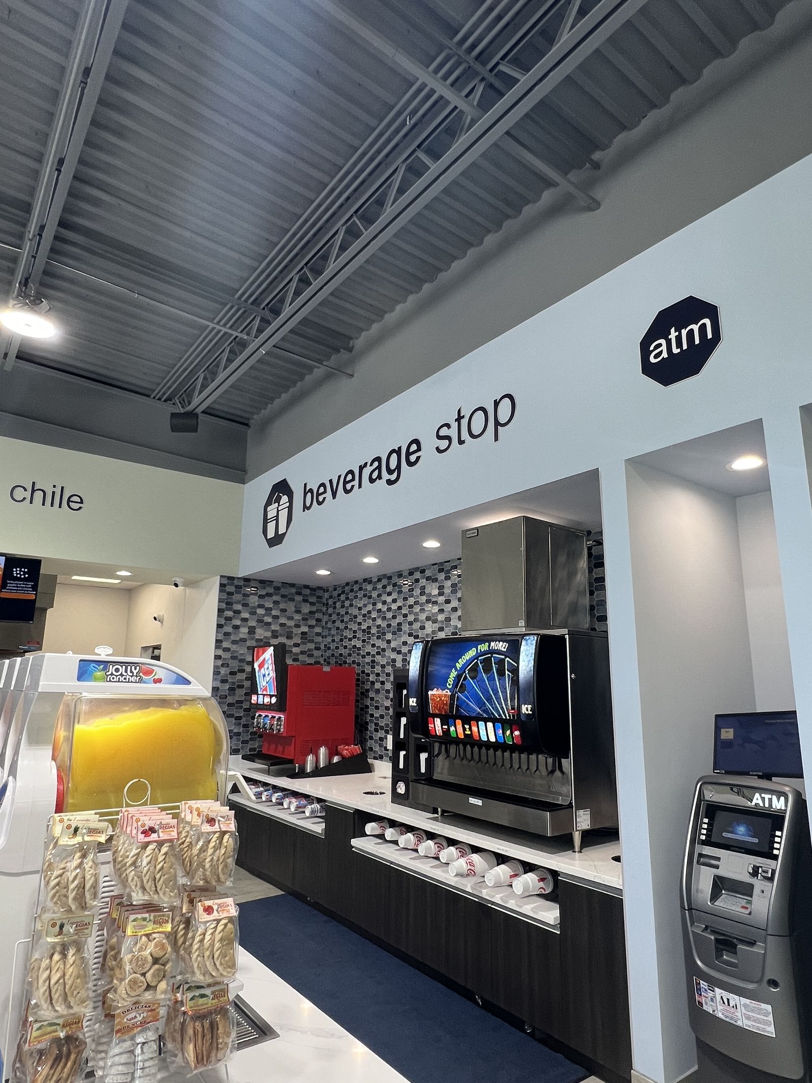 Beverage stop and ATM signage in a convenience store