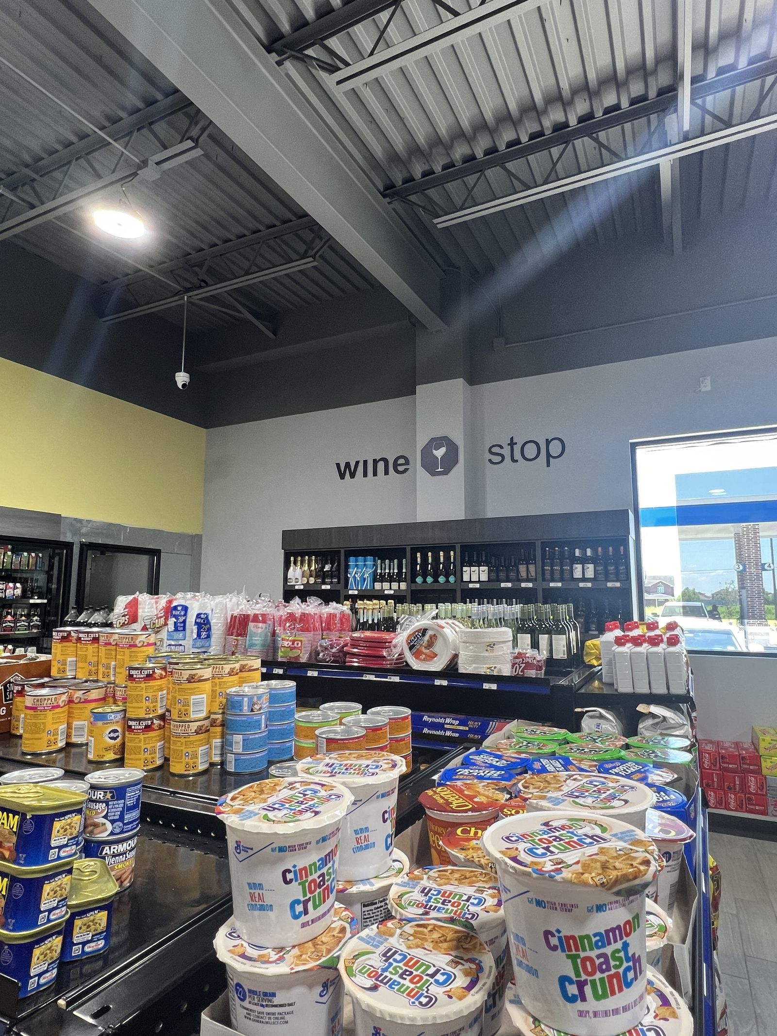 Wine stop wayfinding signage in a convenience store