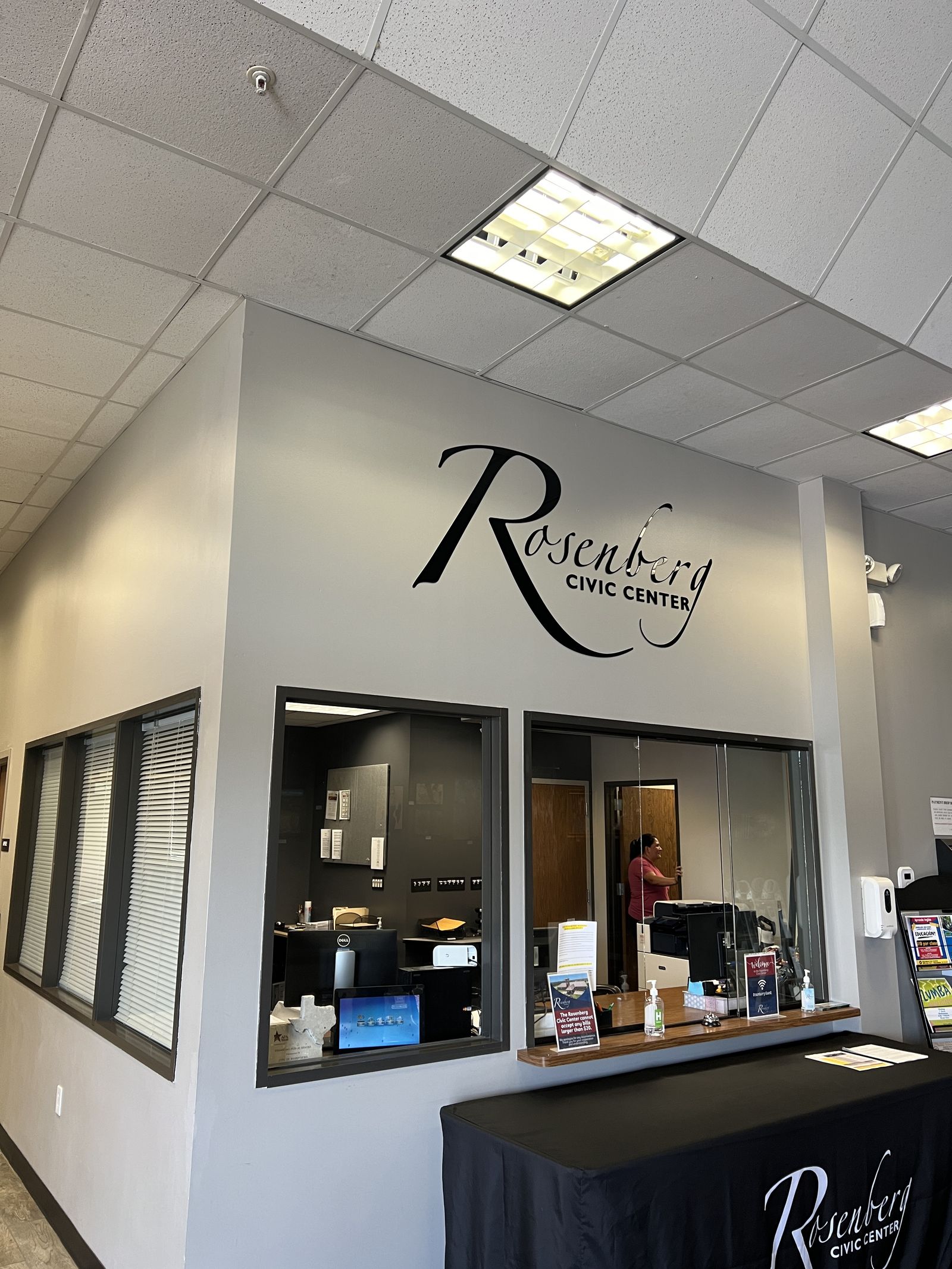 Script reception sign above a front desk